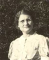 Cora Cain daughter of Perry and Roella Womble Cain. Born in 1894 and passed in 1962. Buried at Guilford Memorial Park. Married to Ernest Michael Briles